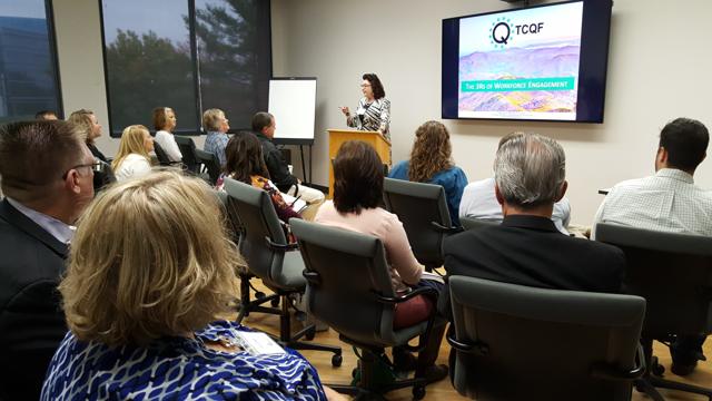 A speaker presenting to a breakout room