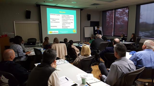 Attendees following a breakout presentation